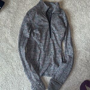Lululemon run briskly half zip in color gray and neon. Size 2